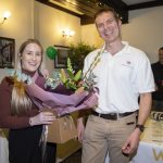 Paul presents flowers to Emma