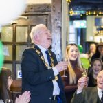 Mayor laughing
